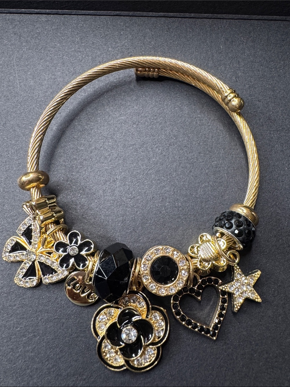 Gold Tone Black Crystal Charm Bracelet